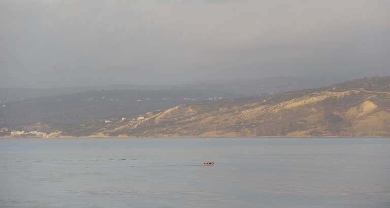 Picture of boat people near Lesbos island